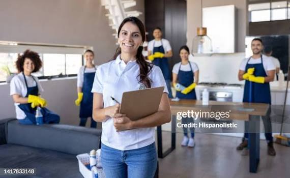 Team cleaning office